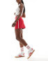 Cotton On mini sport skirt in red with white stripe