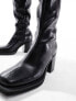 Фото #4 товара ASOS DESIGN over the knee heeled chelsea boots on chunky sole in black