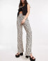 ASOS DESIGN plisse flare trouser in geo print