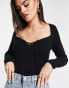 Фото #2 товара ASOS DESIGN knitted top with sweetheart neck and lace up front detail in black