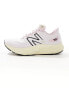 New Balance Evoz running trainers in light pink