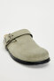 Split suede clogs with buckle