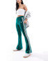 Фото #2 товара adidas Originals three stripe flared leggings in collegiate green