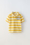 Embroidered striped terry polo shirt