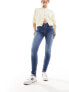 Фото #4 товара Levi's 710 super skinny fit jeans in mid blue