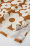 Floral print poncho towel