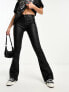 Only mid waist coated flared trousers in black M - фото #1