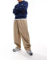 Фото #1 товара Nike Club woven balloon trousers in beige