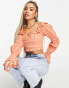 ASOS DESIGN shirred crop top with ruffle detail and volume sleeve in rust