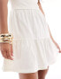 ASOS DESIGN mini bandeau dress with tiered skirt in cream