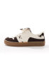 Stradivarius leather trainer in cow print