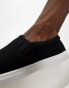 Truffle Collection canvas slip on trainers in black