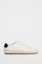 CONTRAST FLAT TRAINERS