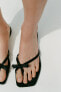 Flat sandals with bow