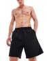 Фото #2 товара Weekday Ed skater style swim shorts in black