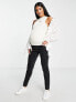 ASOS DESIGN Maternity ultimate skinny jeans in washed black with under the bump waistband