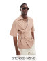 ASOS DESIGN relaxed wrap around textured shirt in dusty pink