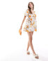 Фото #1 товара Wednesday's Girl citrus floral print smock mini dress in white