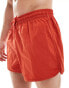 Weekday Tan runner swim shorts in red