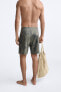 Long spray print swimming trunks