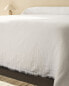 Ruffled muslin bedspread