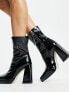 RAID Vista heeled sock boots in black vinyl