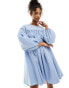 ASOS DESIGN extreme gathered smock mini dress with exaggerated sleeve and bow back in blue