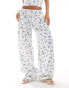 Фото #2 товара ASOS DESIGN waffle wide leg trouser co-ord in floral and blueberry print