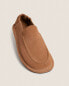 Topstitched leather babouche slippers