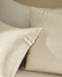 Cushion cover with trim detail