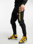 Polo Ralph Lauren sports capsule leg logo cuffed joggers in black CO-ORD