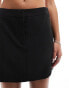 Edited tailored mini skirt in black