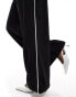 ASOS DESIGN pull on trouser with contrast piping in black