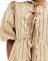 Glamorous smock top with bow front in beige brown stripe