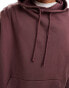 ASOS DESIGN essential oversized hoodie in acid wash burgundy