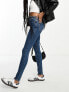 ASOS DESIGN Tall skinny jeans in mid blue