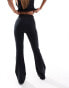 ASOS 4505 soft touch slim kick flare with ruched waist in black