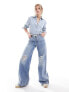 Фото #1 товара Levi's '94 baggy wide leg jeans in light blue wash with distressing