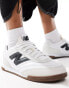 New Balance RC42 trainers in white and black