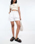 Фото #1 товара Urban Revivo paper bag waist shorts in white