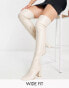 Фото #1 товара Truffle Collection Wide Fit leather look thigh high heeled boots in cream