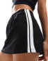 Фото #3 товара Cotton On sporty jersey mini skirt in black