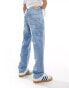 Фото #4 товара Tommy Jeans skater carpenter jeans in light wash