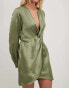 NA-KD twist front satin mini dress in green