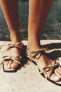 Flat slider sandals with bows