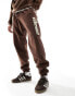 ellesse Garsi logo joggers in dark brown