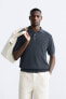 Textured knit polo shirt
