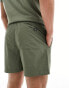 Calvin Klein monogram medium drawstring swim short in olive