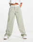 Фото #1 товара Pull&Bear fold over waistband tailored trousers in sage