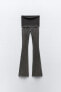 Faded-effect ribbed trousers